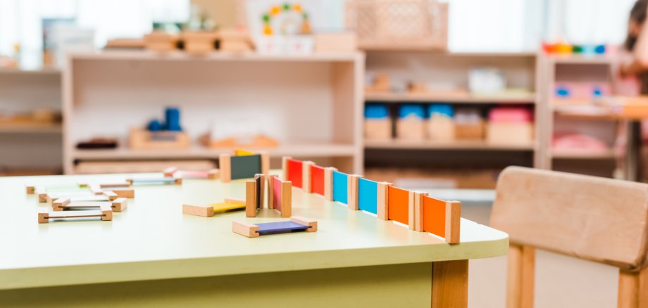 Selective focus of educational game on table in montessori school